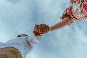 Christian Couple Holding Hands